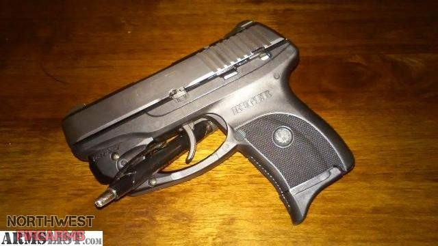 3540787_01_ruger_lc9_with_lasermax_and_ex_640.jpg