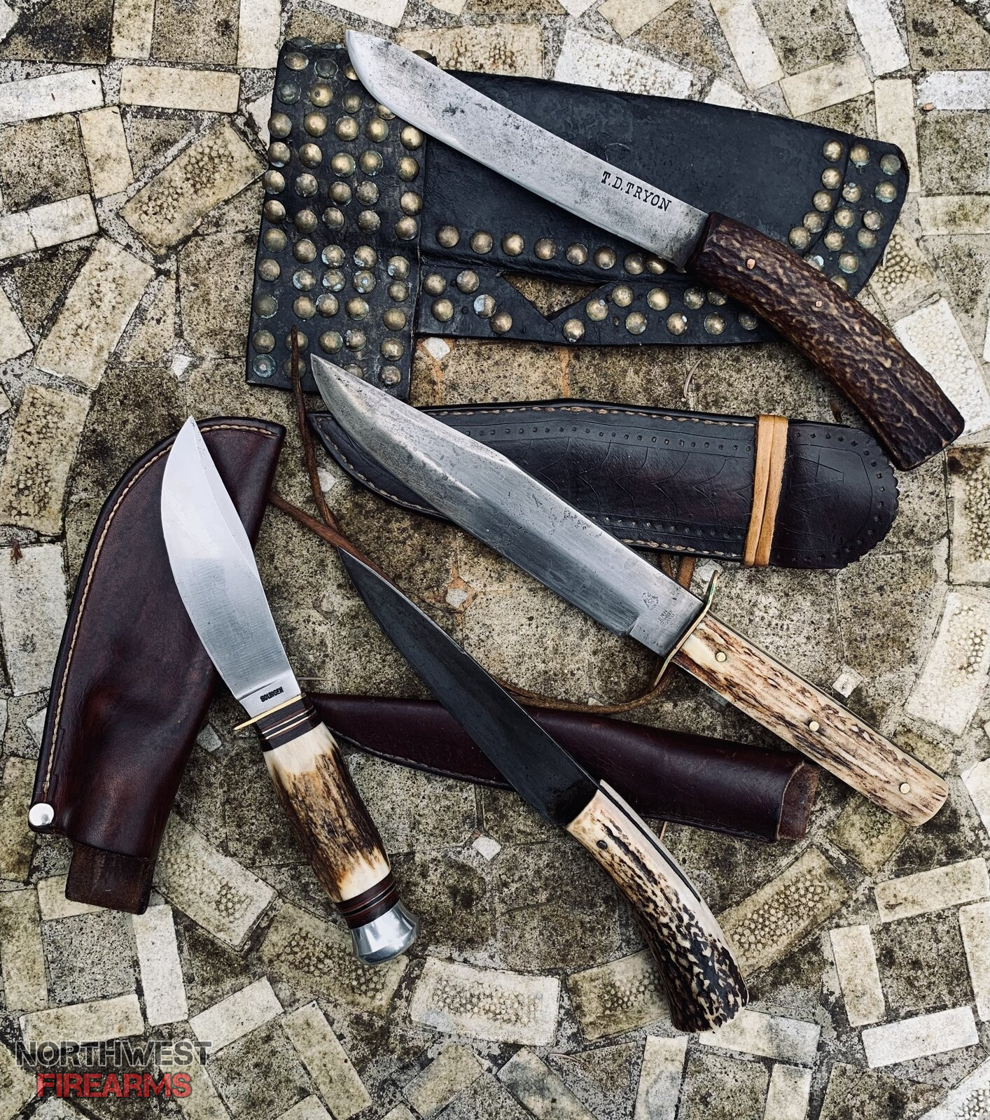 Knives with stag handles.
